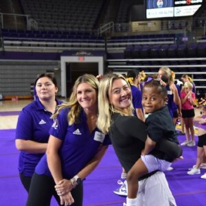 Kindergartener from RHA's care facility attends cheerleading camp